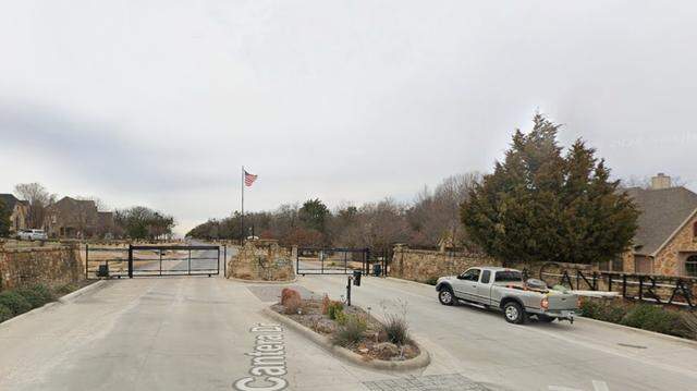 An image from Google Streetview shows the gate leading into the La Cantera neighborhood just outside the Fort Worth city limits. Tarrant County maintains the public Billings Road in the private community behind the gate.